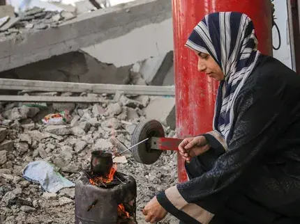UN Women spoke with three generations of women from one family in Gaza, who have endured war, displacement, and uncertainty for decades. Kholoud Al Gourani, 28 recounts the horrors with a heavy heart: "This war defies all comprehension. We never imagined we would lose our homes, our cherished memories, and our loved ones. Displacement has become our constant reality." Gaza. September 2024. Photo: UN Women/Suleiman Hajji.